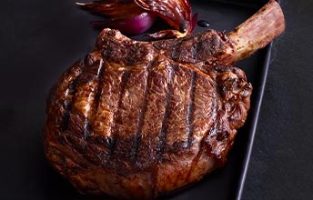 grilled ribeye steak with balsamic red onions